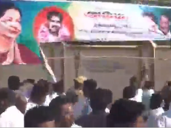 AMMK caders tear ADMK banners 