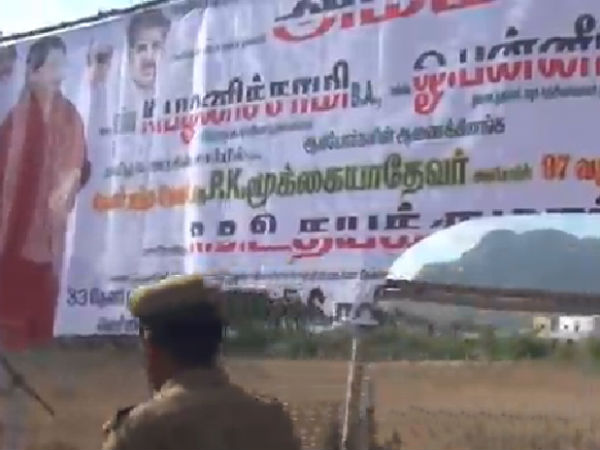 AMMK caders tear ADMK banners 
