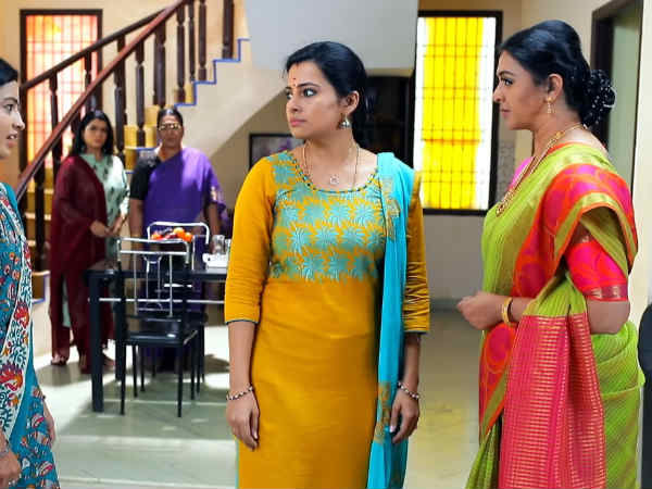 Azhagammai chases her husband with watchman 