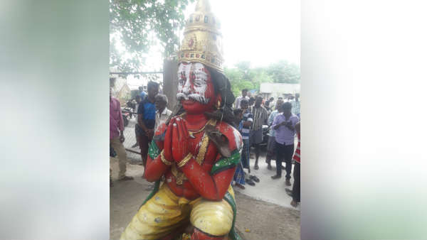 Unknown mob put slipper garland to Muniyappa god 