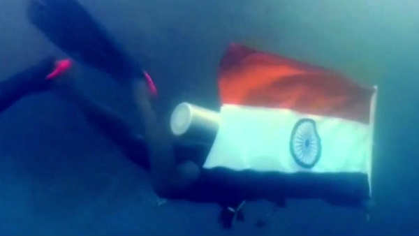 Swimming experts from Pondicherry swim with National Flag
