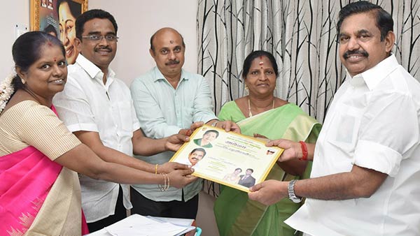 admk mla manonmani sivakumar avoid ops image in her family marriage invitation 
