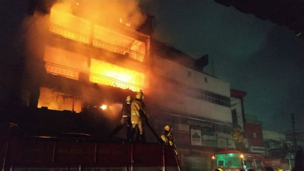 fire accident in kovilpatti chennai silks showroom 