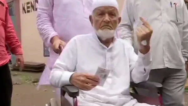 Voting held in candlelight due to no electricity in pune Voting held in candlelight due to no electricity in pune