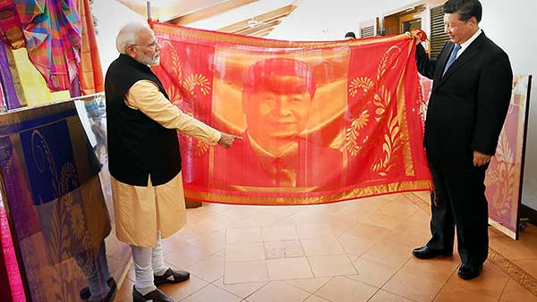PM Modi, Xi Jinping on kovalam artefacts and handloom