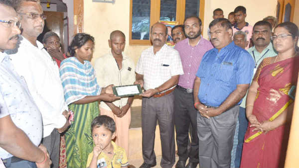 tn government pays Rs 10 lakh check to Sujiths parents tn government pays Rs 10 lakh check to Sujiths parents