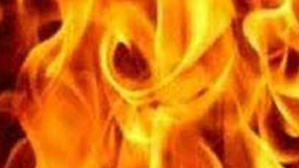 கொளுத்திய தந்தை 