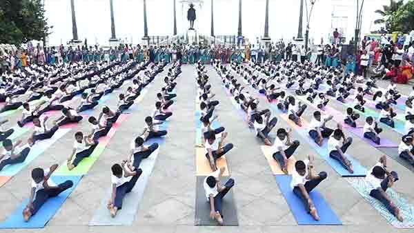 In Puducherry Beach Road School students perform various yoga poses 