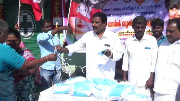 Admk party members face mask distribution to the public 