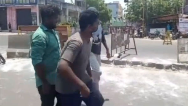 chennai youth says gives kiss, in police after curfew break down chennai youth says gives kiss, in police after curfew break down