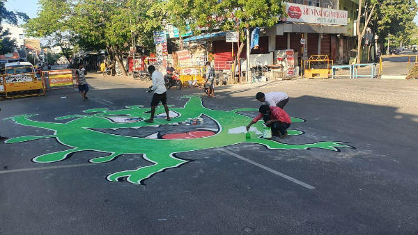 Awareness of coronavirus is being painted on the roads in Puducherry Awareness of coronavirus is being painted on the roads in Puducherry