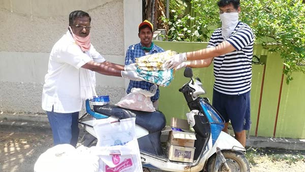 Government College professors in Puducherry offer relief to poor families Government College professors in Puducherry offer relief to poor families