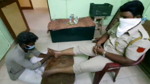 A youth in Puducherry is giving free Acupressure treatment to police A youth in Puducherry is giving free Acupressure treatment to police