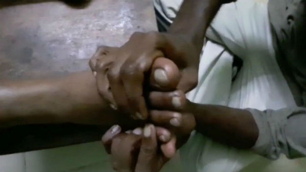 A youth in Puducherry is giving free Acupressure treatment to police A youth in Puducherry is giving free Acupressure treatment to police