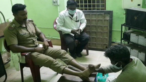 A youth in Puducherry is giving free Acupressure treatment to police A youth in Puducherry is giving free Acupressure treatment to police