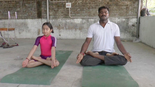 A school student in Puducherry has raised awareness of corona through yoga A school student in Puducherry has raised awareness of corona through yoga