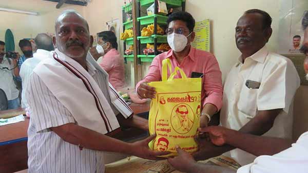 DMK MLA Saravanan helps DMK volunteer family who runs barber shop 