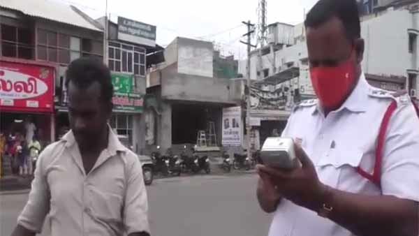 Inspirational story: Bike riders getting mask from Karur traffic inspector 