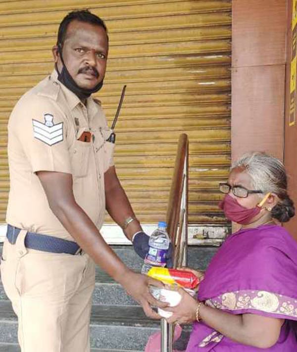  trichy policeman helps poor woman