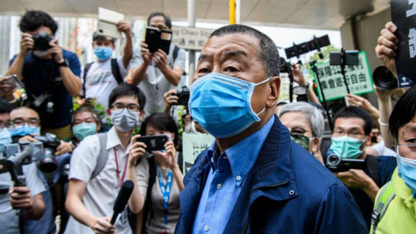 Hong Kong pro-democracy newspaper owner has been arrested by new security law Hong Kong pro-democracy newspaper owner has been arrested by new security law