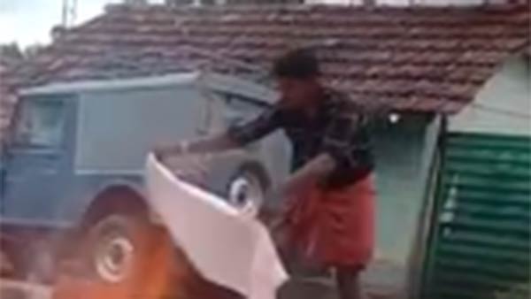 வேட்டியால் அணைக்க முயற்சி 