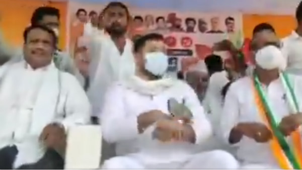 Bihar Assembly Election: Slippers hurled at RJD leader Tejashwi Yadav Bihar Assembly Election: Slippers hurled at RJD leader Tejashwi Yadav