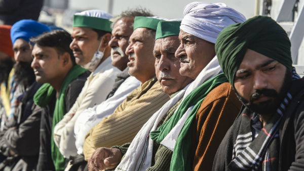 Protesting farmers build bigger stage at Delhis Singhu border 