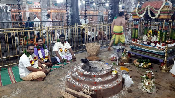 Thiruvannamalai: Praying Pooja at the top of the hill sprinkling of holy water 