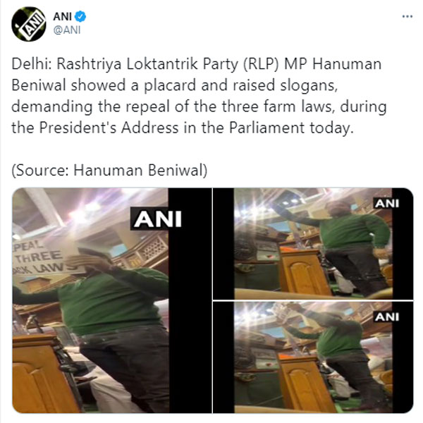 Rashtriya Loktantrik Party MP Hanuman Beniwal showed a placard during president address 