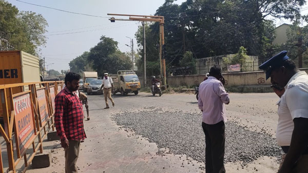 Police clears gravel on NH road which make riders safe journey