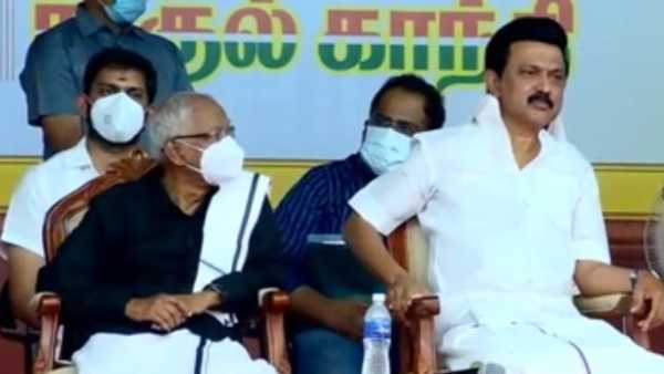 முக கவசம் அணிந்த அதிமுக முக கவசம் அணிந்த அதிமுக