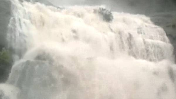 flood in kutralam falls due to heavy rain in western ghats flood in kutralam falls due to heavy rain in western ghats