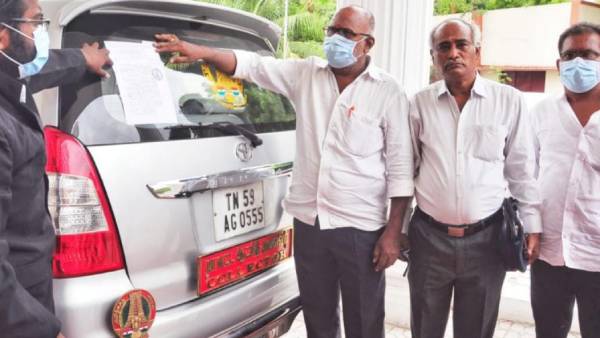 Madurai District Collector car confiscated 