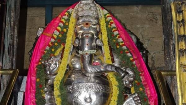 Ganesha Chaturthi Festival: Tirthavari at Pillaiyarpatti - Ganesha shining in golden armor 