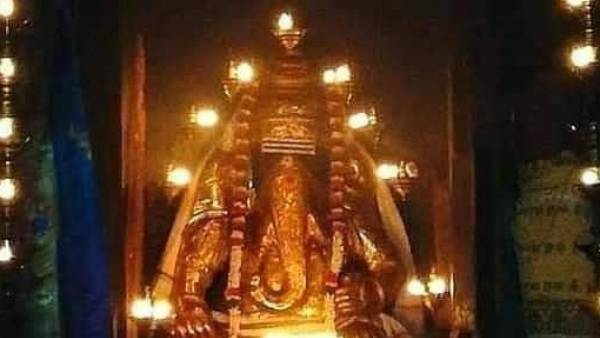Ganesha Chaturthi Festival: Tirthavari at Pillaiyarpatti - Ganesha shining in golden armor 