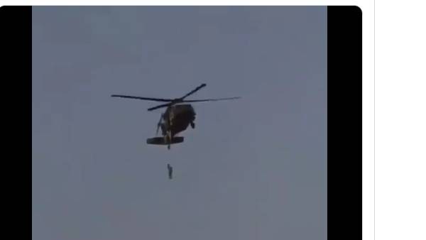  ஹெலிகாப்டரில் உடல் தொங்கியதா? 