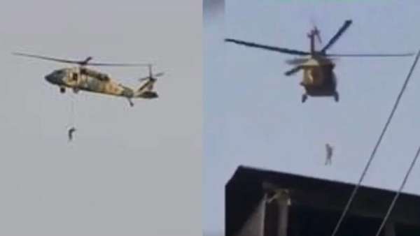 ஹெலிகாப்டரில் தொங்கவிடப்பட்ட சடலம்