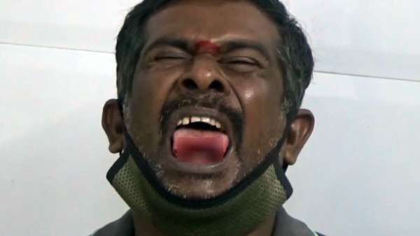 நாக்கை வெட்டினார் 