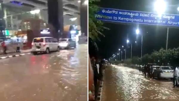 Roads outside Bengaluru airport flooded, passengers take tractor to reach terminal Roads outside Bengaluru airport flooded, passengers take tractor to reach terminal