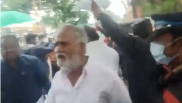 வேட்டியை மடித்துக் கட்டி
