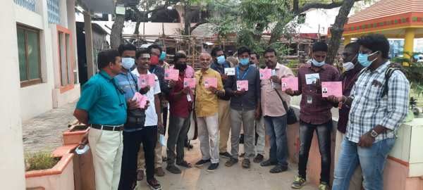 Media persons sit in agitation protest outside poll counting centres 