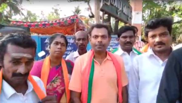 Bjp workers arrested for protesting for not include Modi photo in government banner 