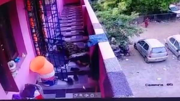 தலைக்குப்புற சரிந்த பெண் 