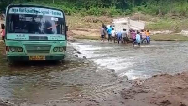 கடுமையாக போராடி பேருந்து மீட்பு கடுமையாக போராடி பேருந்து மீட்பு
