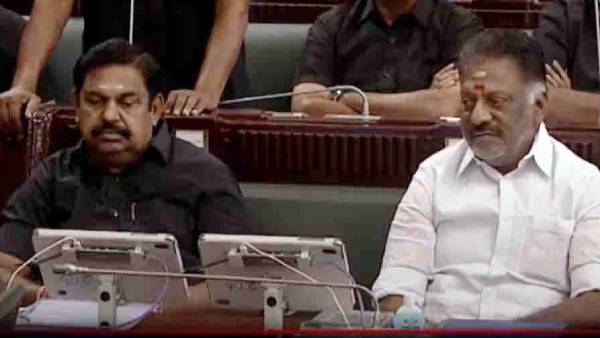  அருகருகே அமர்ந்த இருவர் 