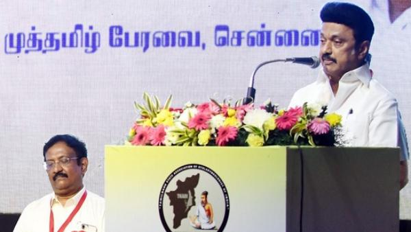 தமிழில்