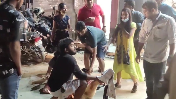 கன்டெய்னர் லாரியின் டயர் ஏறி இறங்கியது 