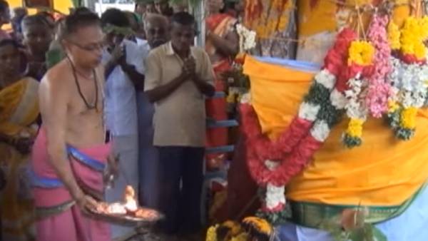 பிரசாதமாக மஞ்சள் கயிறு 