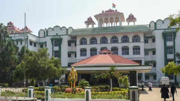 HC Madurai Branch order to TN govt dont use Ex minister C.Vijayabaskars name Arumugasami Commission reports 