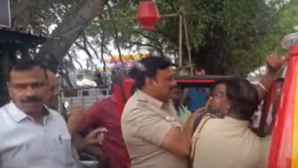 போலீசாரிடம் கடும் வாக்கு வாதம் 